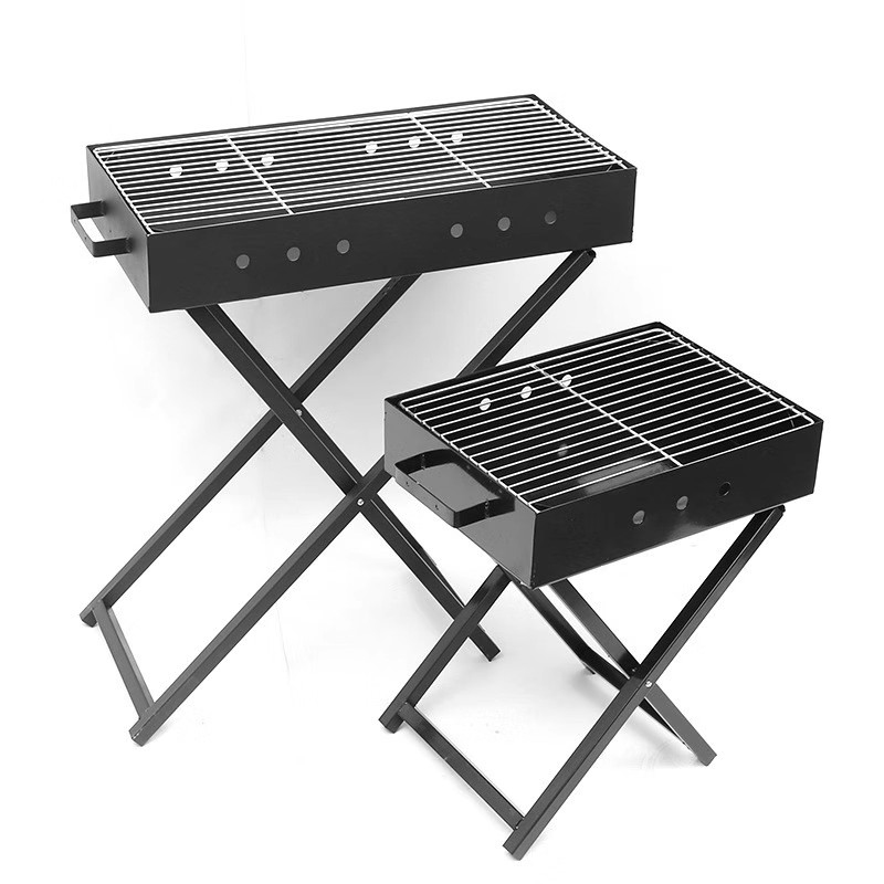 Parrilla de barbacoa en forma de X portátil plegable de acero inoxidable